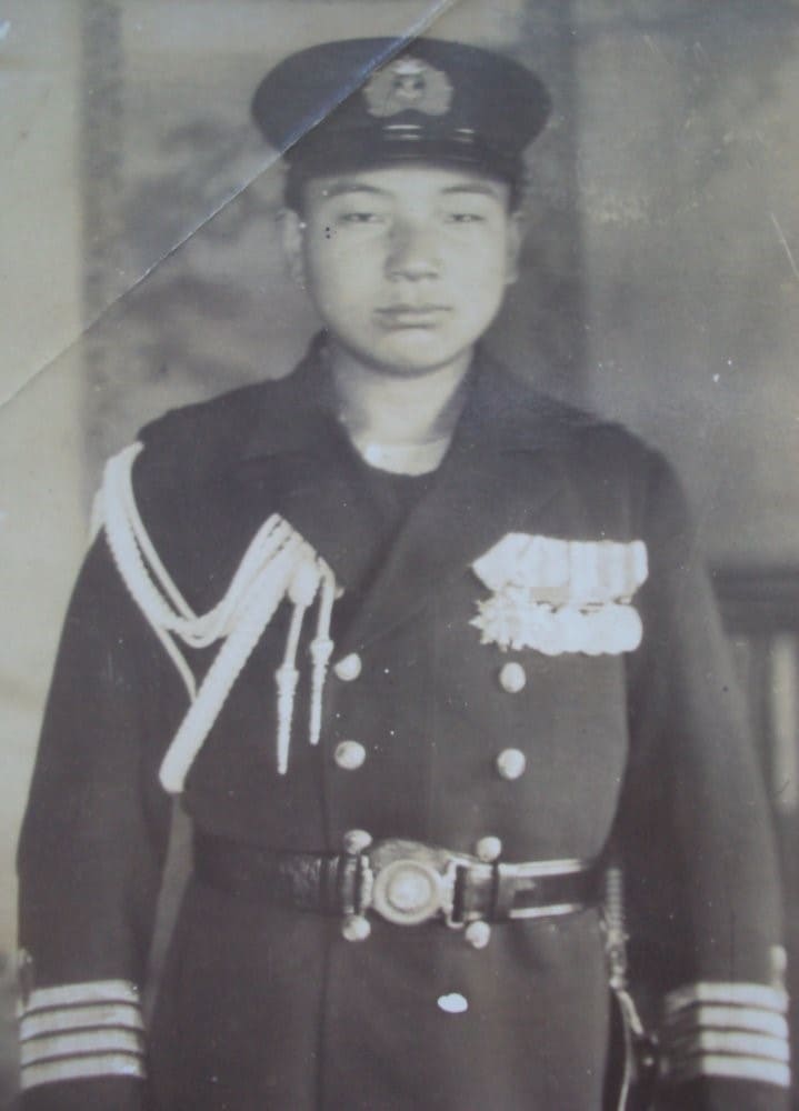 Son of a Navy  Captain with his father's awards.jpg