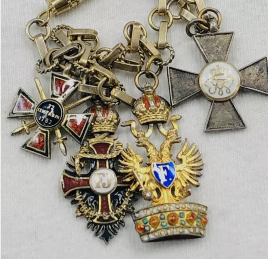 St.Vladimir with swords  on a chain with Austrian and German orders.jpg