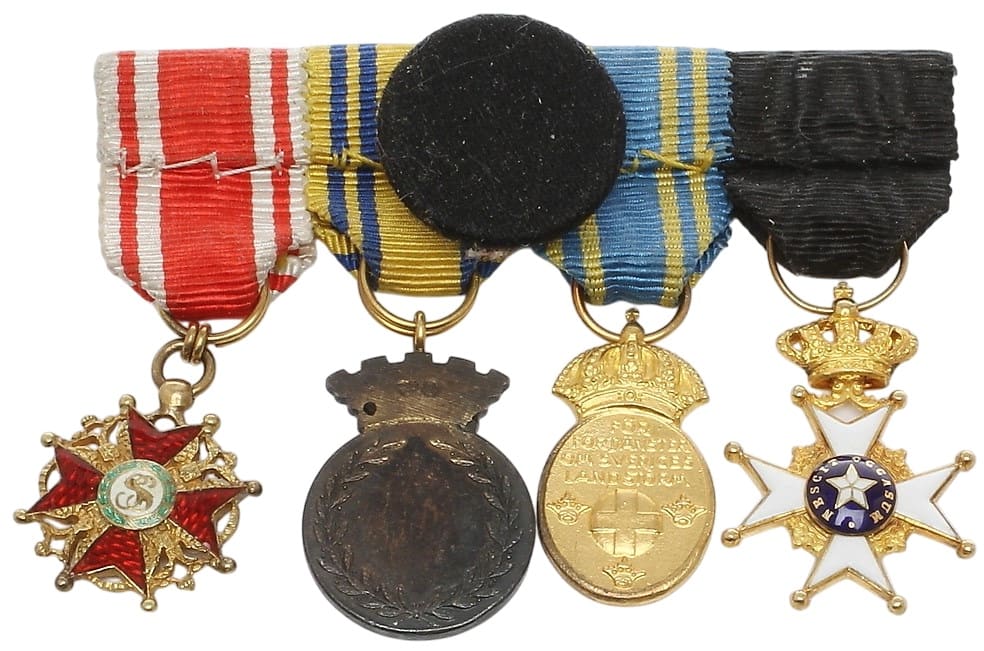 Sweden-made miniature group  of awards with Saint Stanislaus order.jpg