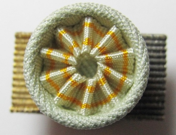 Trident  Breast   Star of the  Order of the Sacred Treasure.jpg