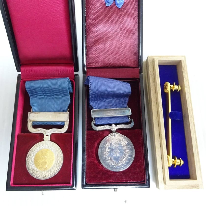 Two Blue Ribbon Medals of Honor of Two Different Types.jpg