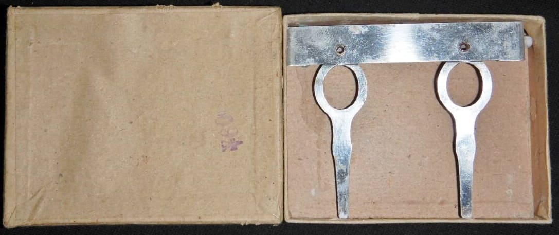 Two-place medal hanger with original case.jpg