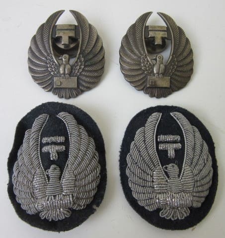 Two variation of Japanese Postal Hat Badges.jpg