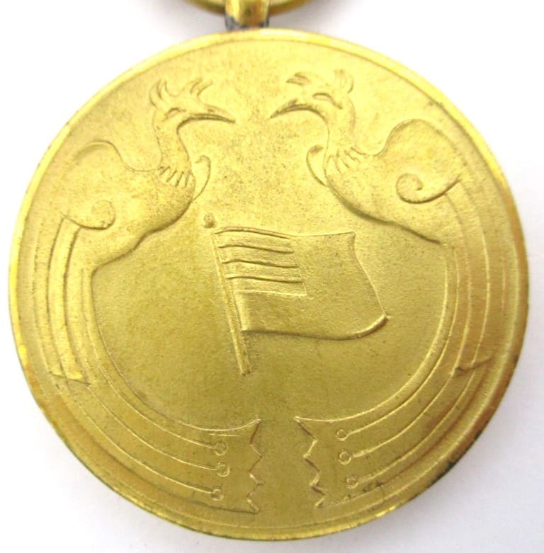 Unofficial  Manchukuo Foundation Commemorative Medal.jpg