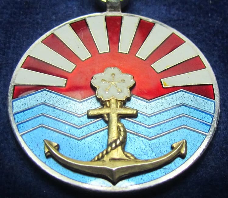 White Merit Badge of Navy League.jpg